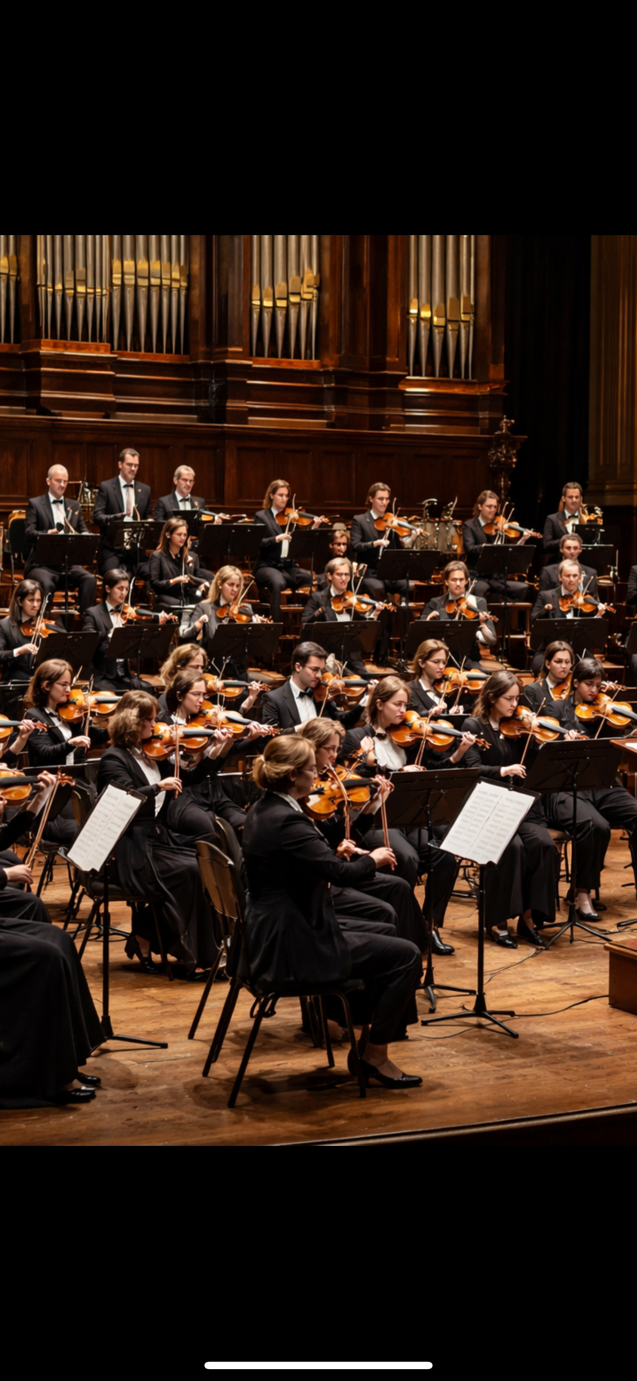 A large orchestra playing their instruments with a massive organ behind them